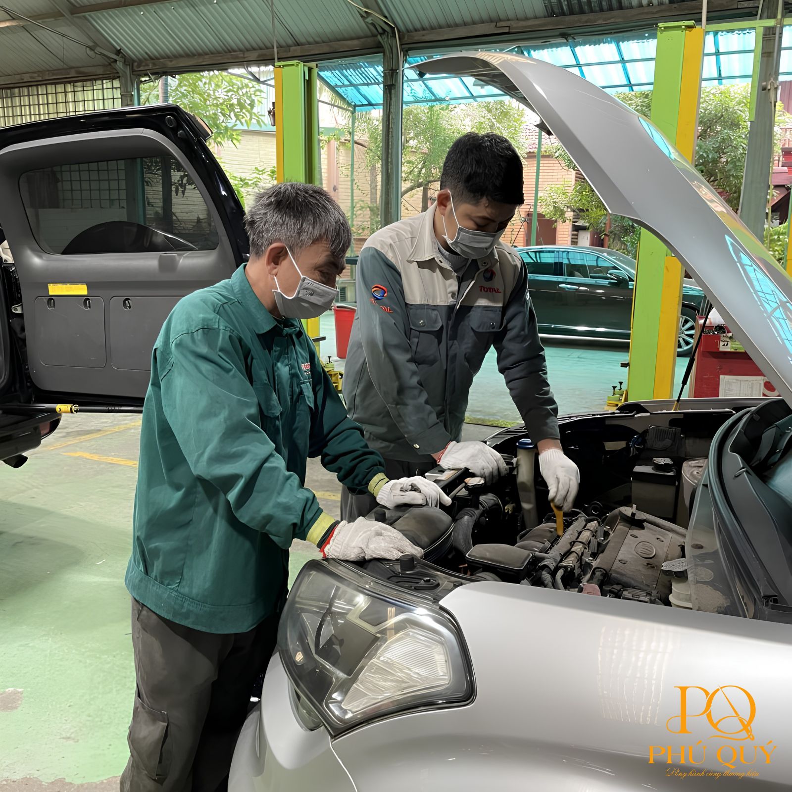 đồng phục garage quang đức đồng phục garage quang đức