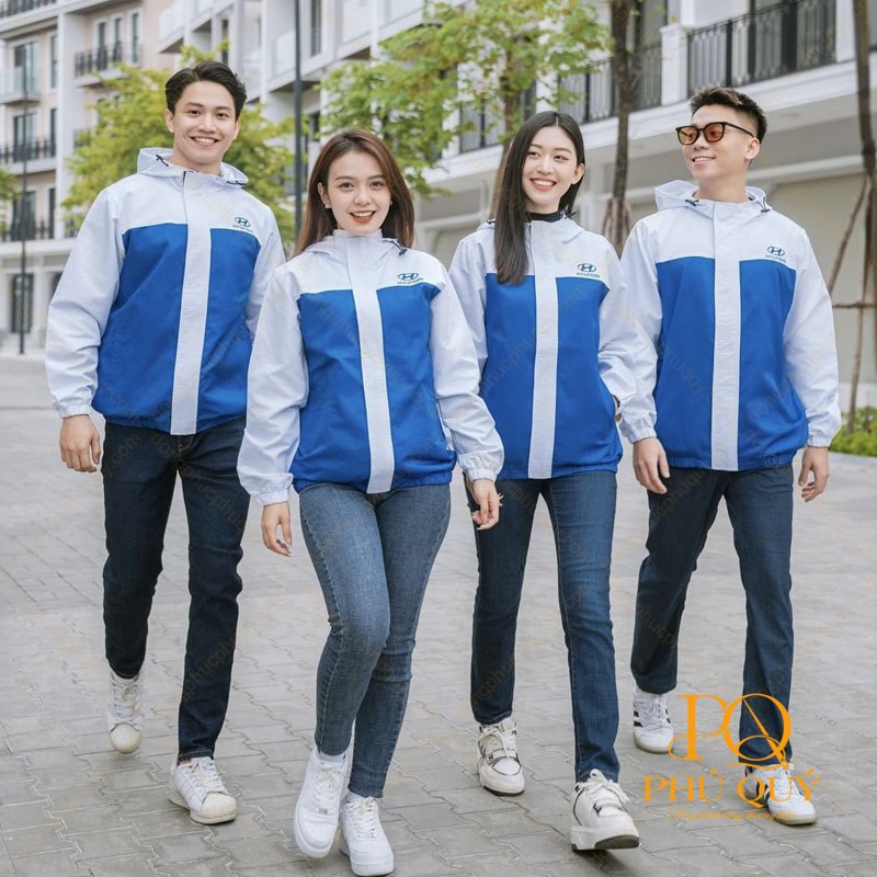 Nhóm nhân viên mặc áo khoác gió đồng phục công sở phối màu